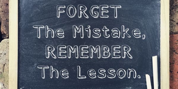 Chalkboard with the motivational quote about learning from mistakes.