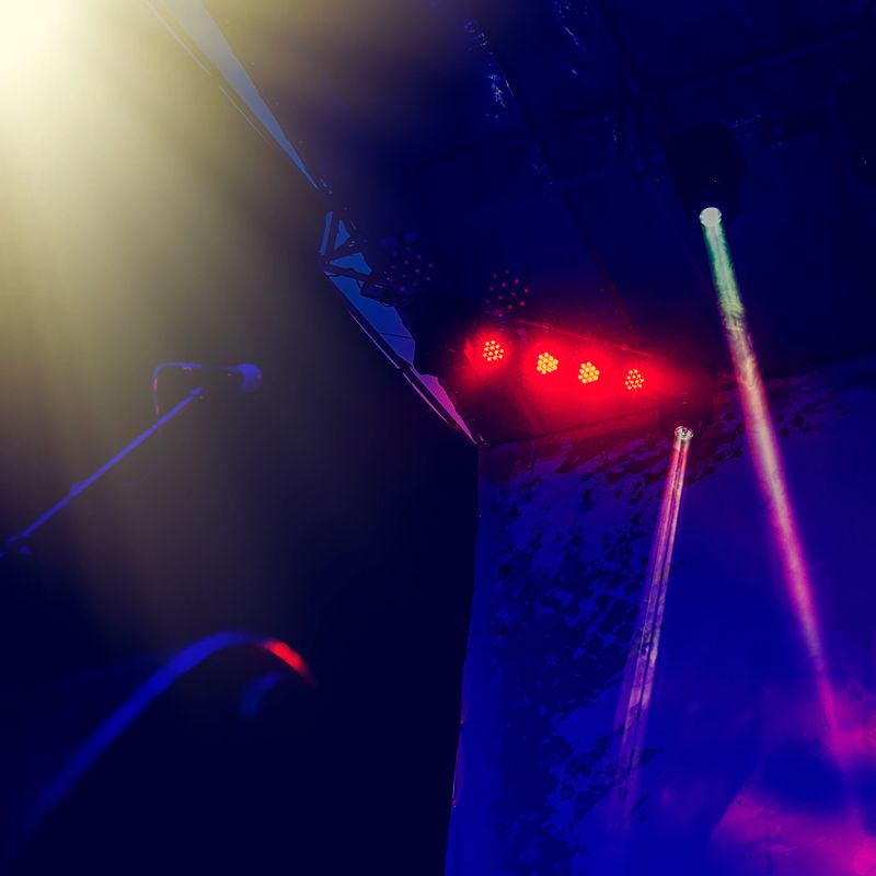 stage lighting during a concert of a rock band. Web banner.Night view.