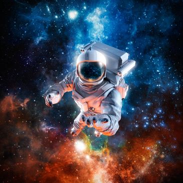 Astronaut reaching out in a colorful, star-filled galaxy.