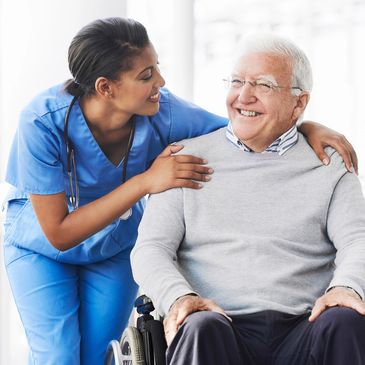 Shot of a young nurse caring for an elderly patient in a wheelchair
