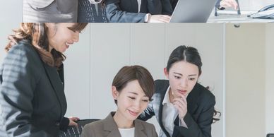 Tax professional preparing 1099, W‑2, and year‑end filing documents for a business.