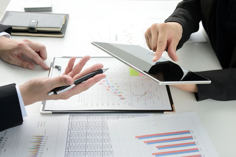 Business professional reviewing a tailored proposal document