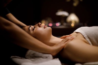 Person receiving a foot massage in a spa.