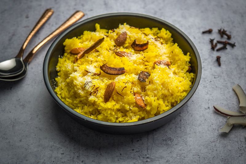 Zarda is a traditional sweet from the Indian subcontinent, made by boiling rice with (orange) food coloring, milk and sugar, and flavoured with cardamoms, raisins, saffron, pistachios or almonds. In the Indian subcontinent, zarda was and still remains a popular dessert on special occasions such as weddings.
