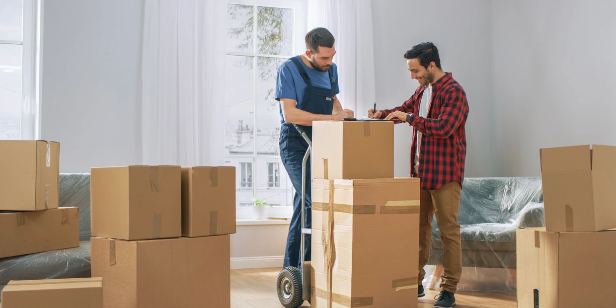 Expert packers securing fragile items Melbourne moving company"