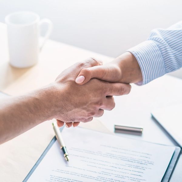 Handshake over documents - trusted Arizona help with divorce papers, custody, and legal forms