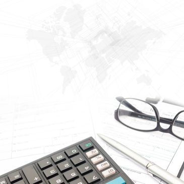 Calculator, pen, and glasses on documents with abstract world map background.