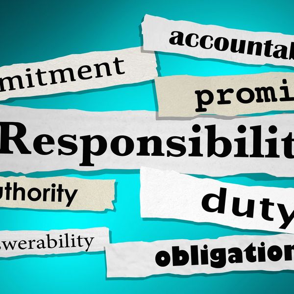 Torn paper strips with words about responsibility concepts on blue background.