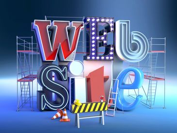 Colorful 3D letters spelling "Website" under construction.
