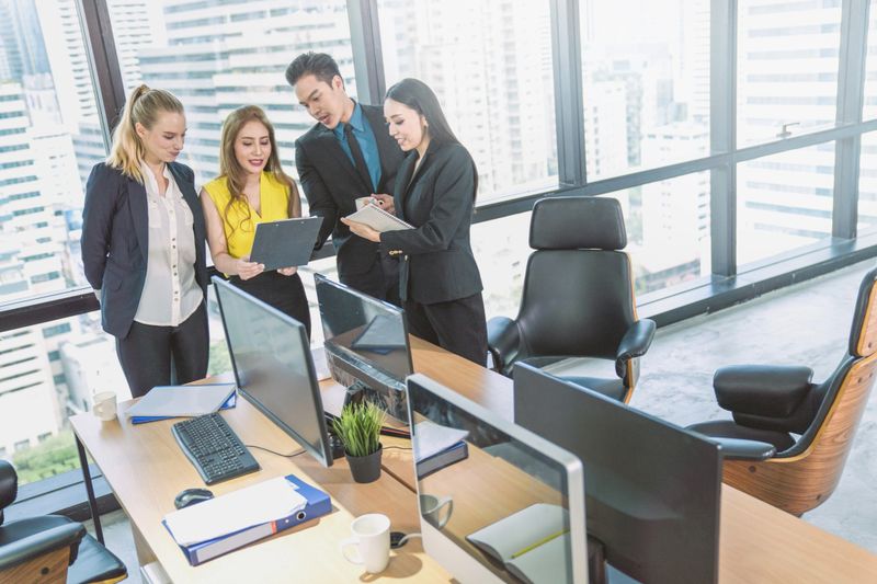 Group Portrait young creative business person working success project with team Business people weare casual suit outfit working happy action in modern Coworking space