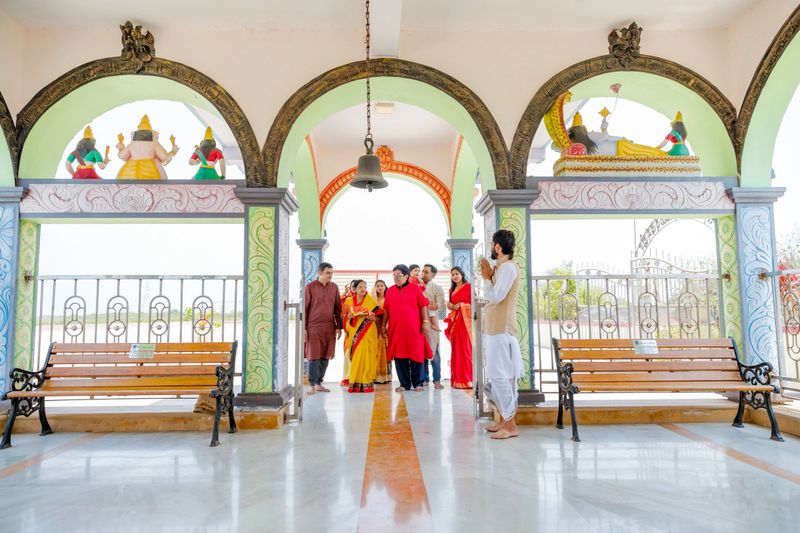 Family, Hindu, Temple, Celebration - A Multi Generation Hindu Family Dressed in Traditional Clothing Arriving at a Hindu Temple for Festive Prayers