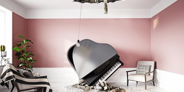 Interior of home, room with big hole in ceiling and piano crashed on floor