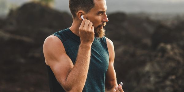 Man in the wilderness looking and feeling fit and connected with nature