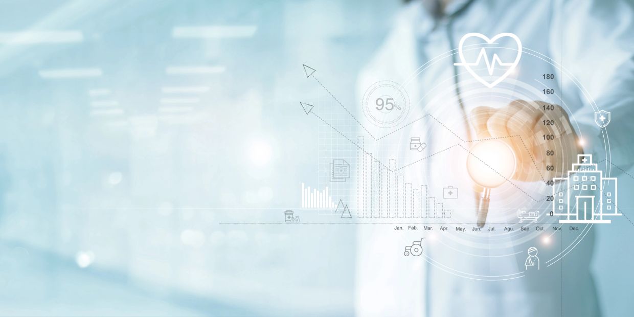 Doctor interacting with digital healthcare data and analytics.