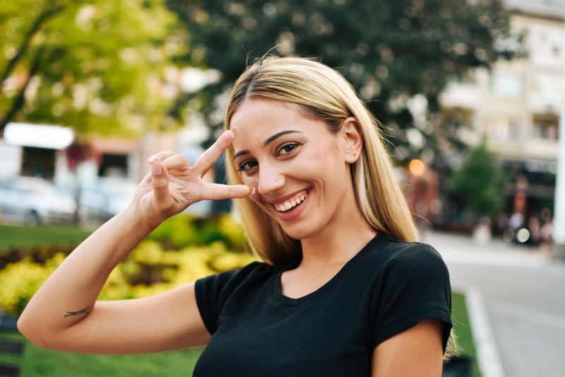 City Street, Gesturing, Peace Sign - Gesture, Smiling, Street