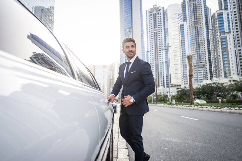 Handsome caucasian businessman - Portrait of a businessman walking outdoors