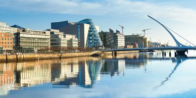 Dublin city from the river Liffey looking at the Convention Centre and Samuel Beckett Bridge.