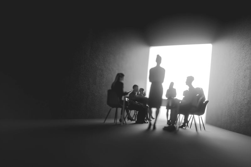 Defocused group of business people. This is entirely 3D generated image.