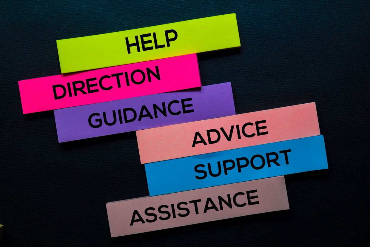 Colorful strips with words help, direction, guidance, advice, support, and assistance.
