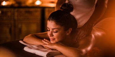 Woman enjoying a relaxing back massage.