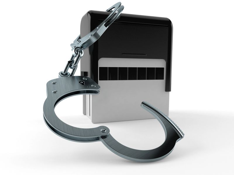 Rubber stamp with handcuffs isolated on white background. 3d illustration