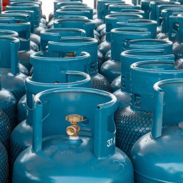 Rows of blue gas cylinders.