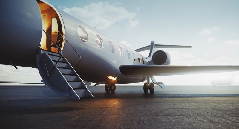 Closeup view of business jet airplane parked at outside and waiting vip persons. Luxury tourism and business travel transportation concept. 3d rendering