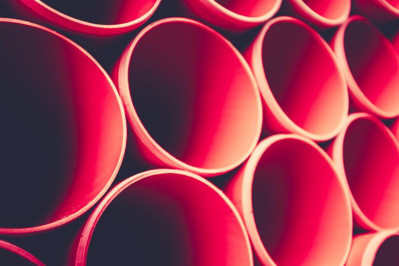 Abstract Background Of Plastic Tubes Or Pipes On A Construction Site
