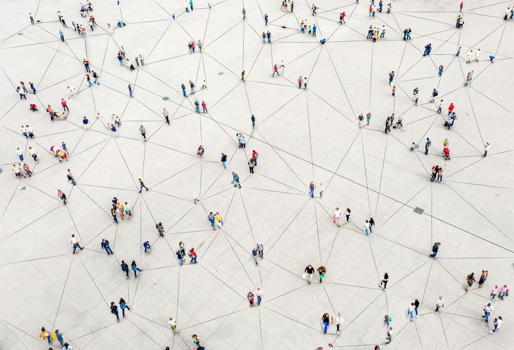 Aerial view of people connected by lines, symbolizing civic participation and collective insight.