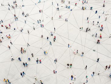 People connected by a network of lines symbolizing social or communication links.