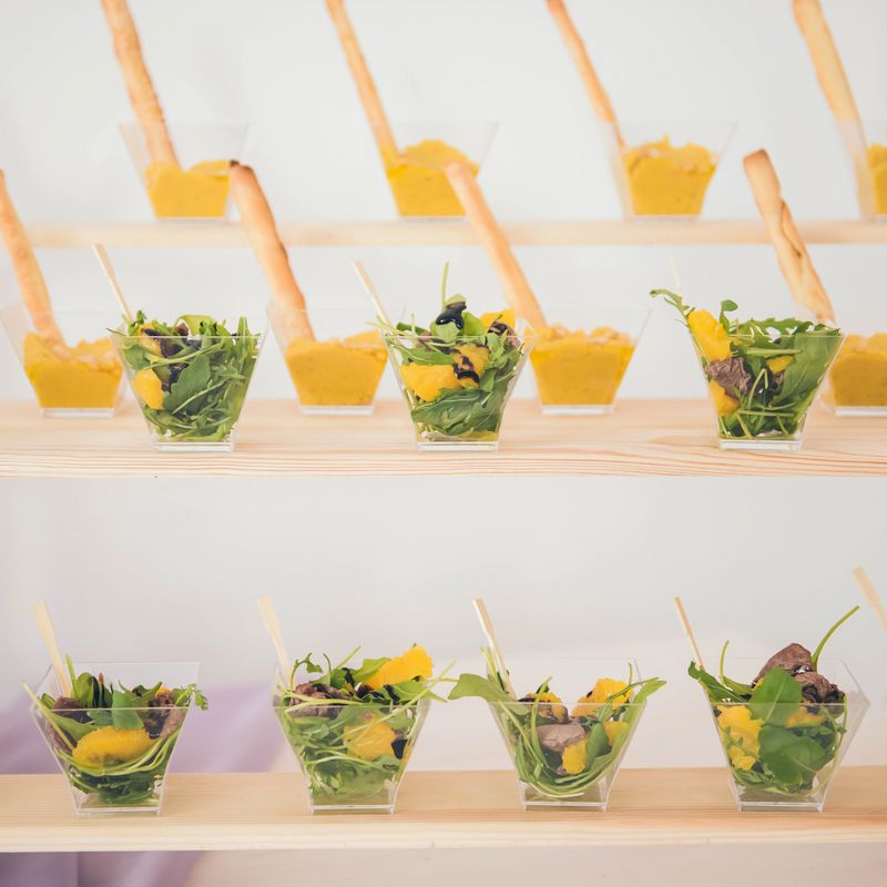 Catering food. Table with food at event. Beautifully served. decorated catering banquet table with different food snacks.