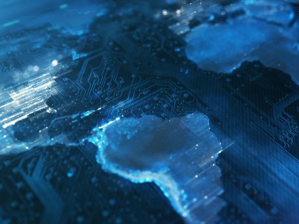 A digital map of the world overlaid on a blue circuit board.