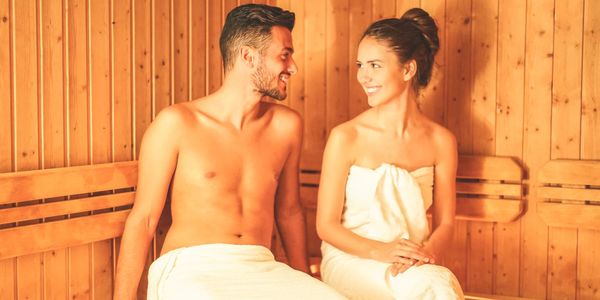 Couple in infrared sauna at Pathway Health & Beauty in Owasso