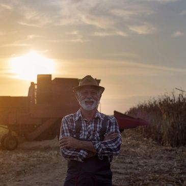 Local worker with picture of sunset in background