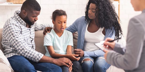 Family receiving family therapy.