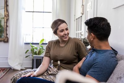 Military couple struggling after deployment and seeking couples therapy.