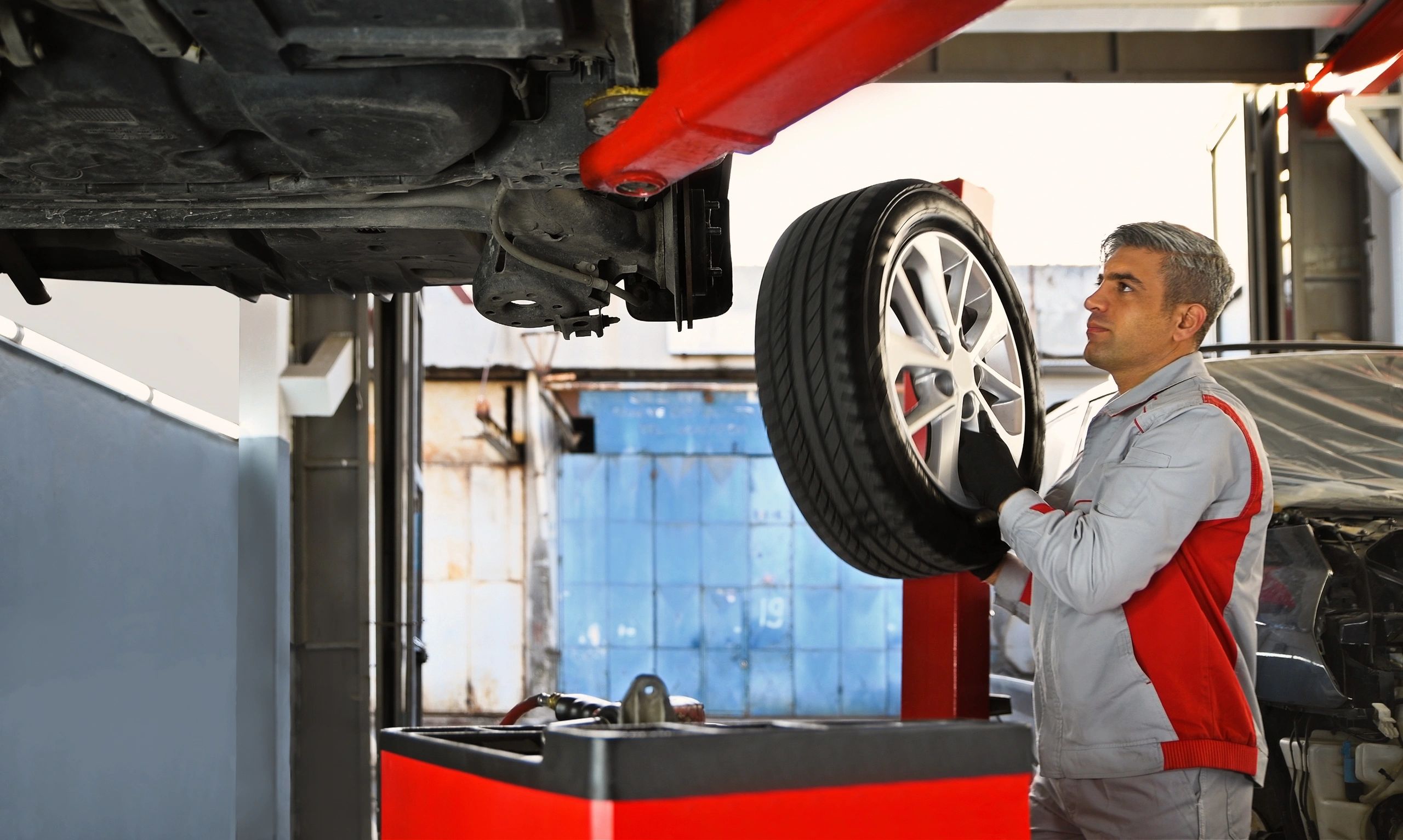 Guy changing tire