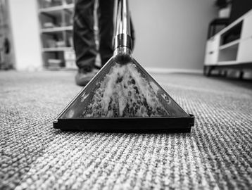 Carpet cleaning tool in use.