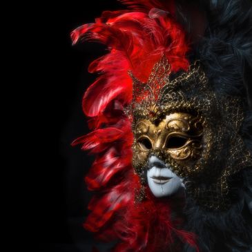 Intricate Venetian mask with red feathers on a black background.
