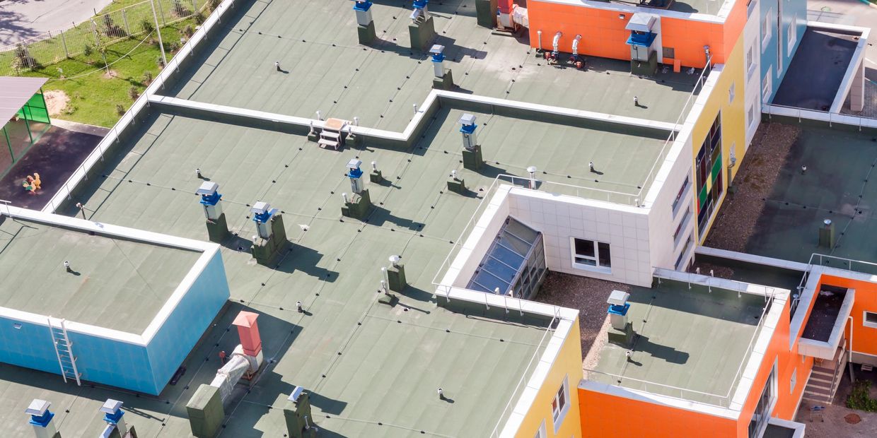 Flat commercial roofing project in Lafayette Louisiana by John Theriot Roofing LLC