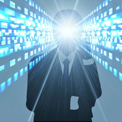 Silhouette of a man with glowing, pixelated head in digital tunnel.