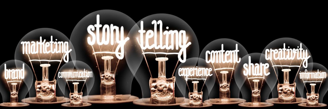 Lightbulbs with marketing and storytelling concepts inside.