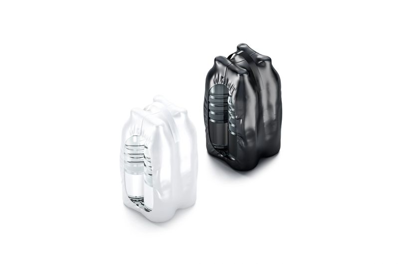 Blank plastic bottle in black and white shrink wrap mockup set, 3d rendering. Empty foil pack with handle for beverage flask mock up isolated, side view. Clear polymer film for market logo template.
