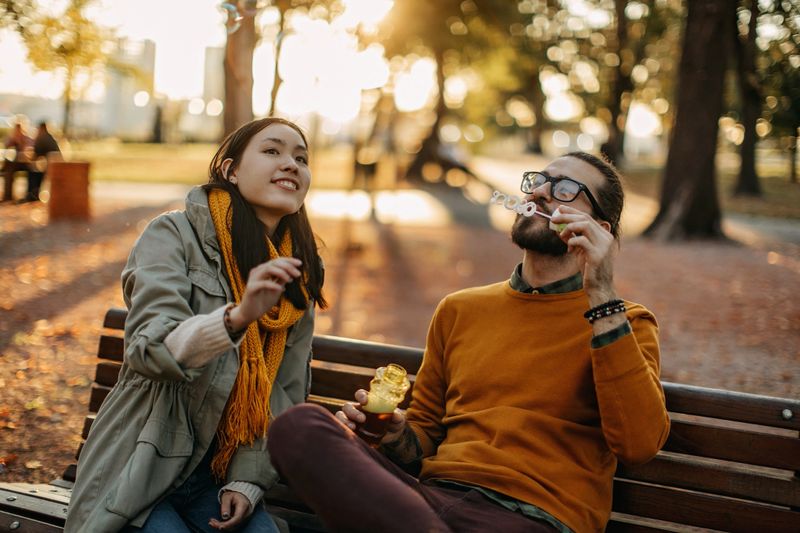 Young woman and young man in the park