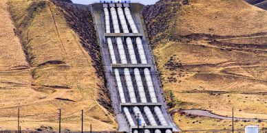 Hydroelectric water pipes running down a hillside.