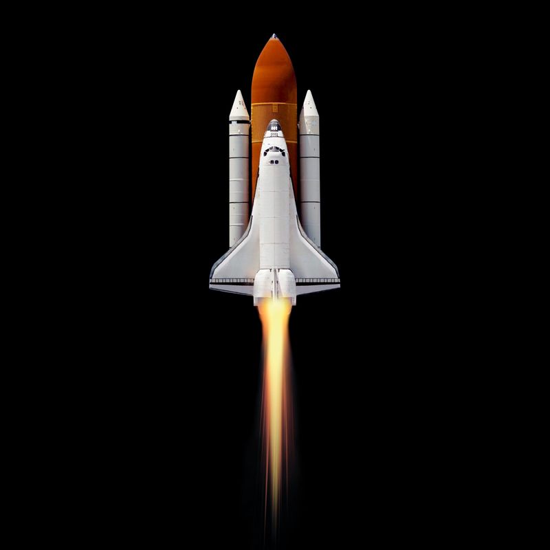 Space shuttle orbiting Earth planet. Elements of this image furnished by NASA