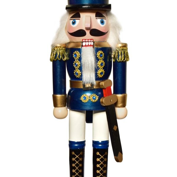 Blue and white nutcracker soldier with a sword.