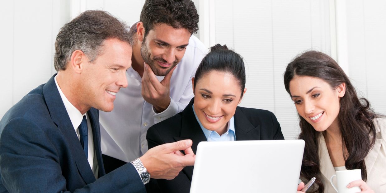 Professionals developing workplace communication skills through collaborative learning