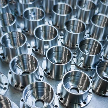 Producción en serie CNC de piezas mecanizadas en PREMSA Industries Monterrey.