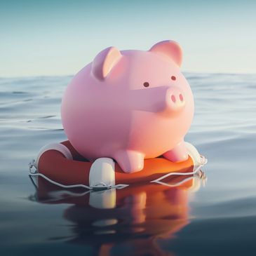 A piggy bank afloat on a life buoy in calm water.